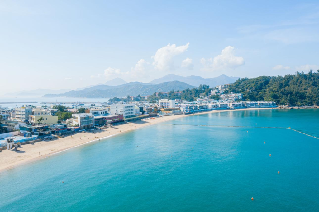Sandy shoreline and calm waters at Tung Wan Beach on Cheung Chau Island.
