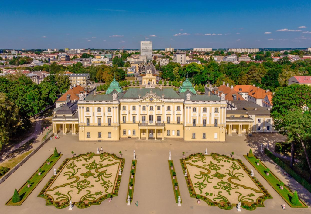 Tourists visiting Branicki Palace in Białystok with historic architecture and gardens.
