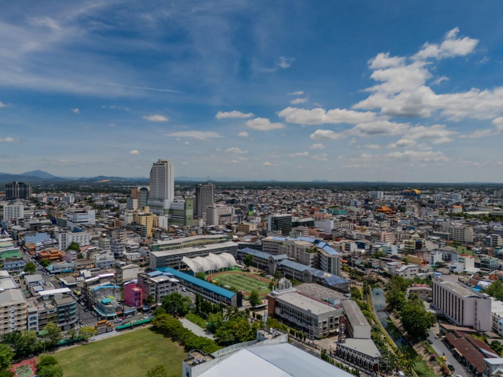 A panoramic aerial view of Hat Yai showing the cityscape and surrounding urban area in southern Thailand.