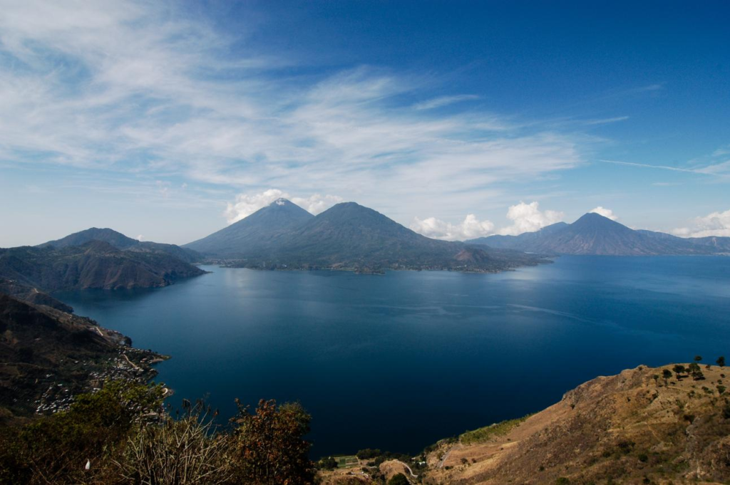 Lake Atitlán surrounded by volcanoes in Guatemala.